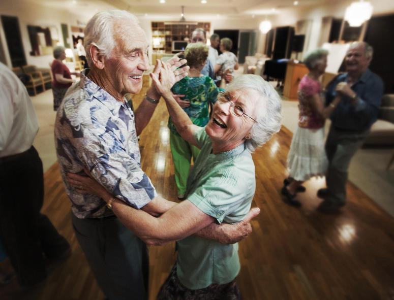 Smiling senior couple dancing